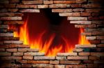 Hole Wall And Fire Stock Photo