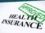 Health Insurance Approved Stamp Stock Photo