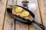 Delicious Baked Rainbow Trout Straight From The Oven With Lemon Stock Photo