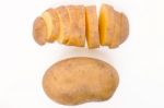 Sliced Potato And Whole Isolated On A White Background Stock Photo