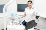 Dental Assitant Smiling At Camera Stock Photo