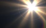 Abstract Thick Lens Flare Light Over Black Background Stock Photo