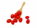 Fresh Grape Or Cherry Tomato With Wooden Spoon On White Backgrou Stock Photo