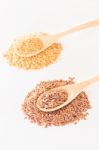 Spoon Of Flax Seed On Clean Kitchen Table Stock Photo