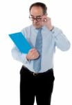 Corporate Person Holding Document Stock Photo