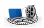 Laptop And Films. Multimedia Concept Stock Photo