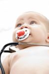 Baby With Stethoscope Stock Photo