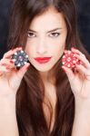 Woman Holding Chips For Gambling Stock Photo