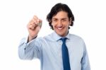 Corporate Male Offering You Office Key Stock Photo