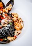  Squid Ink Pasta With King Prawns Stock Photo