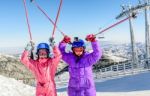 Two Little Girls Enjoying Skiing On Kopaonik, Serbia Stock Photo