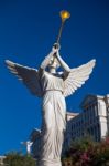 Angel Playing Golden Bugle Stock Photo