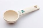 Measuring Spoon On White Background Stock Photo