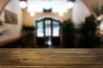 Selected Focus Empty Brown Wooden Table And Coffee Shop Or Resta Stock Photo