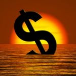 Sinking Dollar Sign In Sea Stock Photo