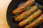 Sausages & Rosemary Stock Photo