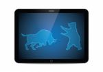 Stock Market Bull And Bear Tablet Stock Photo