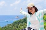 Women Tourists Extend The Arms Happily Stock Photo