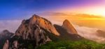 Bukhansan Mountains Is Covered By Morning Fog And Sunrise In Bukhansan National Park, Seoul In South Korea Stock Photo
