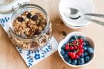 Healthy Breakfast With Granola And Fresh Fruits Stock Photo