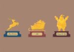 Set Of Gold Christmas Trophy Stock Photo