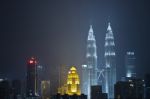 Kuala Lumpur, Malaysia At Night Petronas Bldg Twin Towers Stock Photo