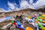 Prayer Flags On Snow Mountains At Yading Stock Photo