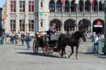 Horse And Carriage In Market Square Bruges West Flanders In Belg Stock Photo