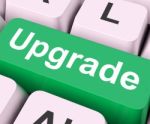 Upgrade Key Means Improve Or Update
 Stock Photo