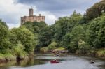 People Rowing Along The River Coquet In Warkworth Stock Photo