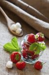 Red Strawberries In Glass Jar Stock Photo