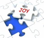 Joy Puzzle Shows Cheerful Joyful Fun Happy And Enjoy Stock Photo