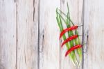 Red Hot Chilli Pepper And Scallions Stock Photo