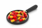 Magnifying Pills Stock Photo