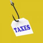 Taxes On Hook Means Taxation Or Legal Fees Stock Photo