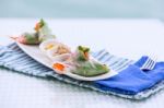 Vietnamese Spring Rolls With Vegetables And Coriander On A Plate Stock Photo