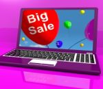 Big Sale Balloon On Laptop Shows Online Discounts Stock Photo
