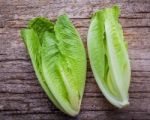 Food Background And Salad Concept With Fresh Cos Lettuce Flat La Stock Photo