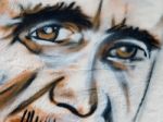 Close-up Of A Face Painted On The Wall Of Southwold Pier Stock Photo