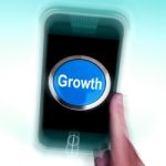 Growth On Mobile Phone Means Get Better Bigger And Developed Stock Photo