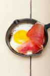 Egg Sunny Side Up With Italian Speck Ham Stock Photo