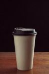 Paper Cup On Wood Stock Photo