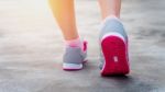 Exercise - Running Shoes Closeup Of Woman, Female Jogging Stock Photo