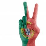 Portugal Flag On Hand Stock Photo