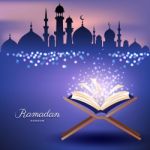 Muslim Quran With Mosque And Abstract Candles Light For Ramadan Stock Photo