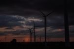 Wind Turbines With The Sunset Stock Photo