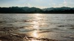 Mekong River Reflects Sunlight Stock Photo
