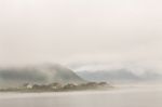 Norway Village In Clouds Of Fog. Cloudy Nordic Day Stock Photo