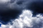 Dark Storm Cloud With Sun On The Sky Stock Photo