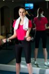 Fitness Woman Lifting Dumbbells Stock Photo